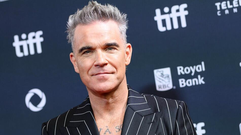 Robbie Williams soll sich derzeit genau überlegen, welche Karriereschritte er geht.