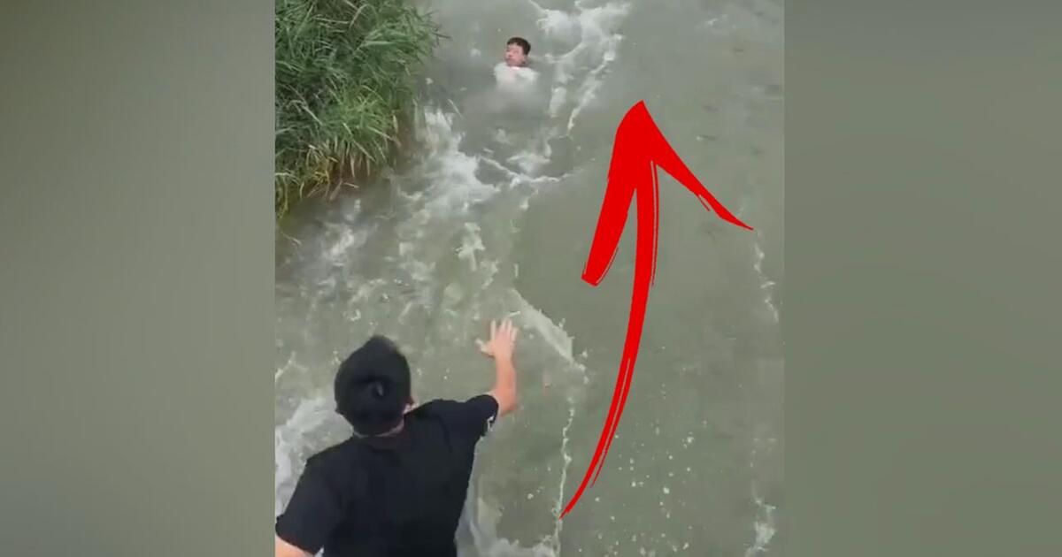 Junge fällt in reißenden Fluss Retter springt von Brücke 1&1