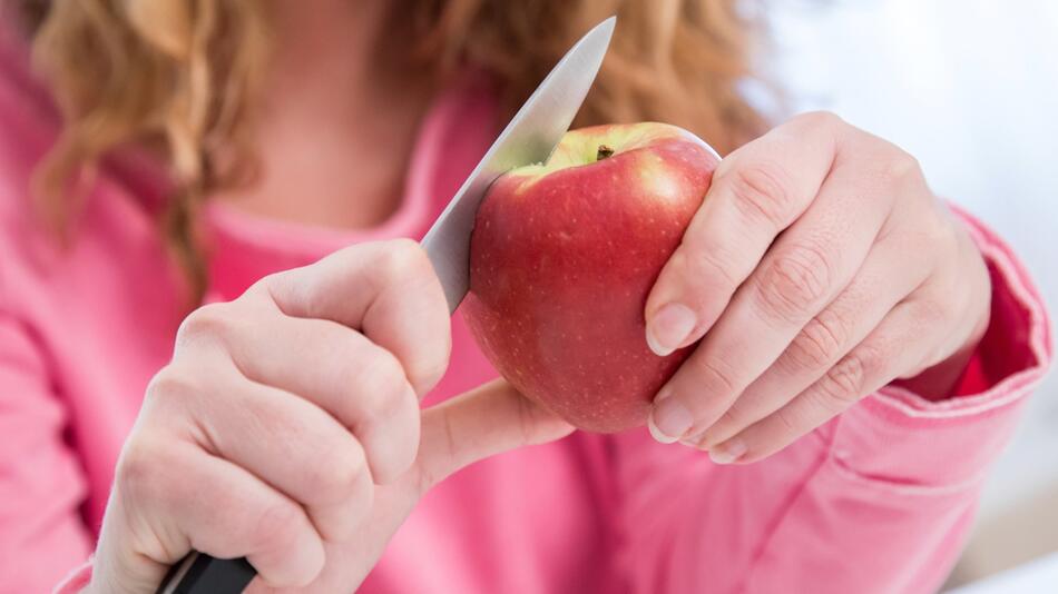 Vorsicht mit dem Apfel