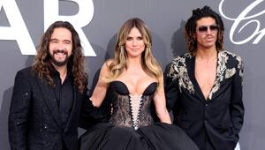 Tom Kaulitz (l.), Heidi Klum und Henry Samuel auf der amfAR-Gala in Cannes im Mai 2026.