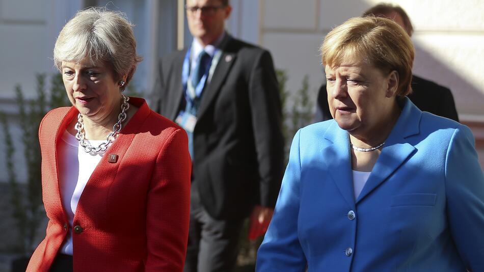 Theresa May Angela Merkel