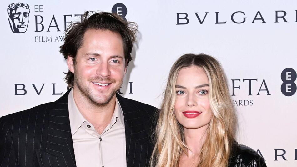 Margot Robbie und Tom Ackerley sind patriotisch, was Snacks betrifft.