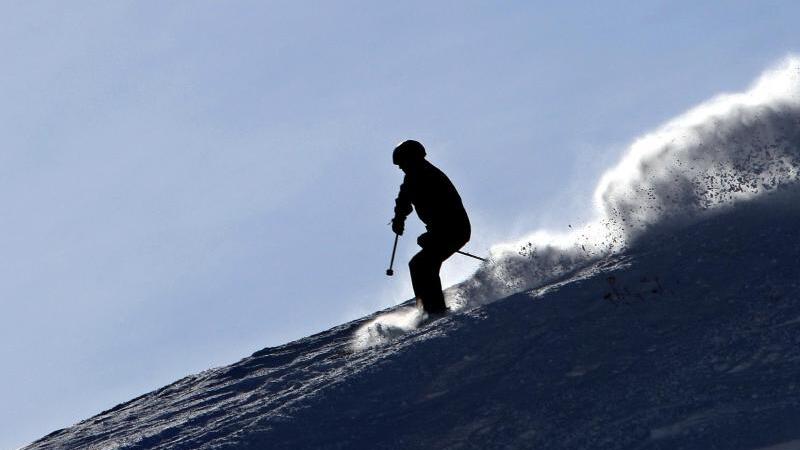 Wintersportler in den Alpen